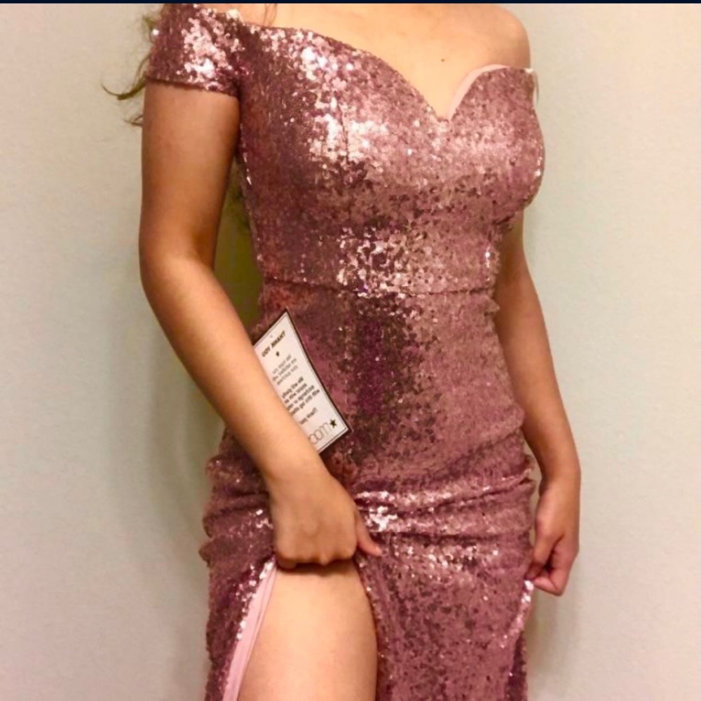 rose gold sequined off the shoulder gown